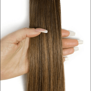 Image suggestion: A photo of a person with a LA Weave hairstyle, highlighting the micro rings and weft.