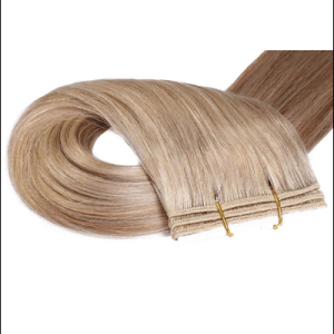 Image suggestion: A photo of tape-in hair extensions, highlighting the flat and seamless application.